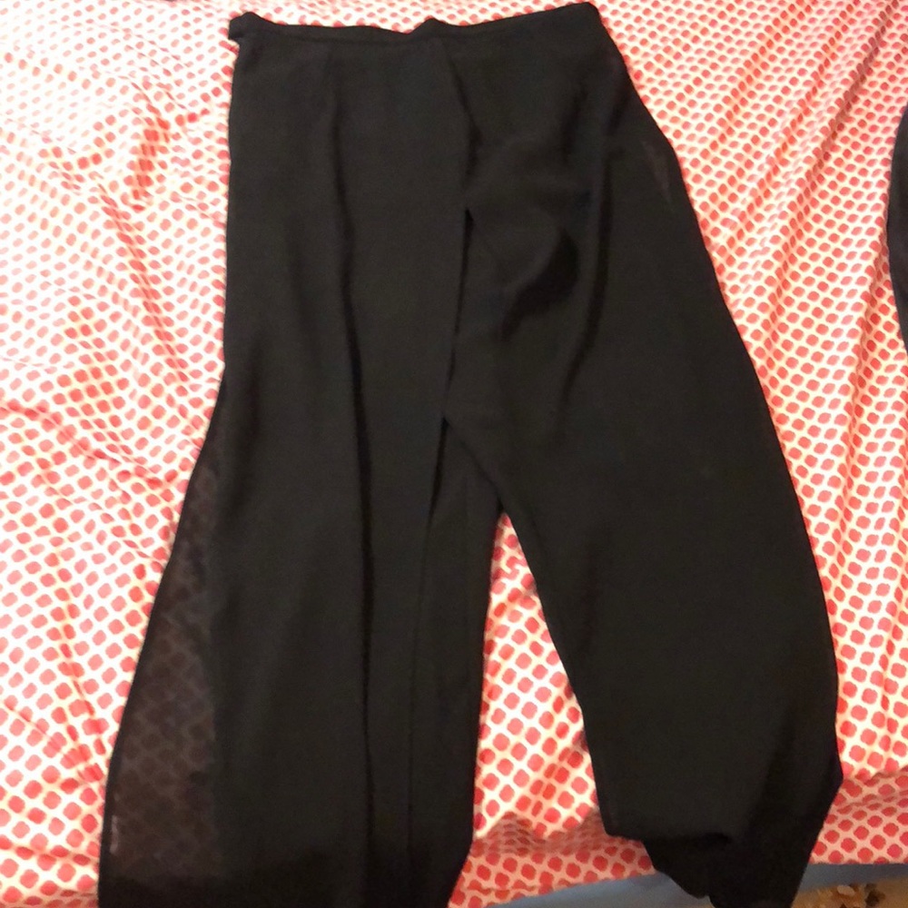 A pair of after 5 black flare pants.